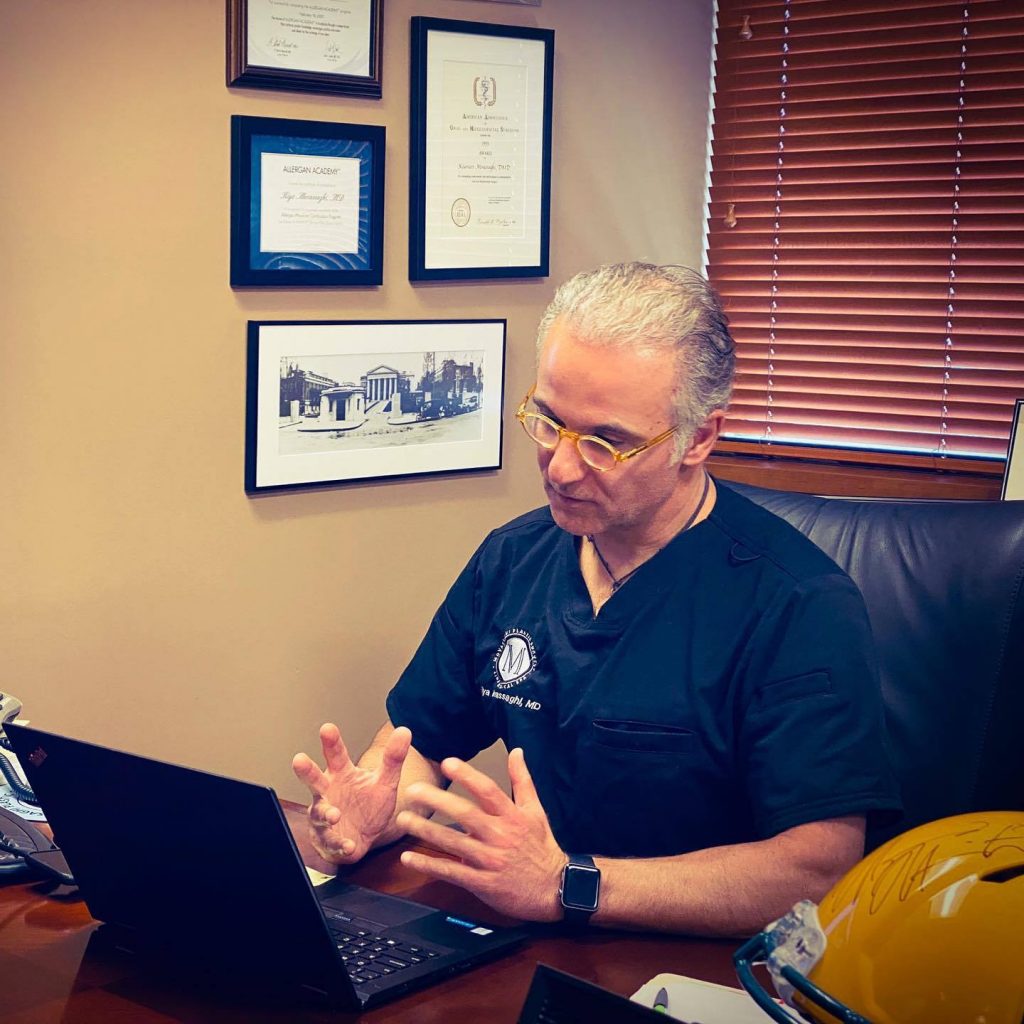 Dr. Kiya Movassaghi performing a virtual consultation at his Eugene plastic surgery practice