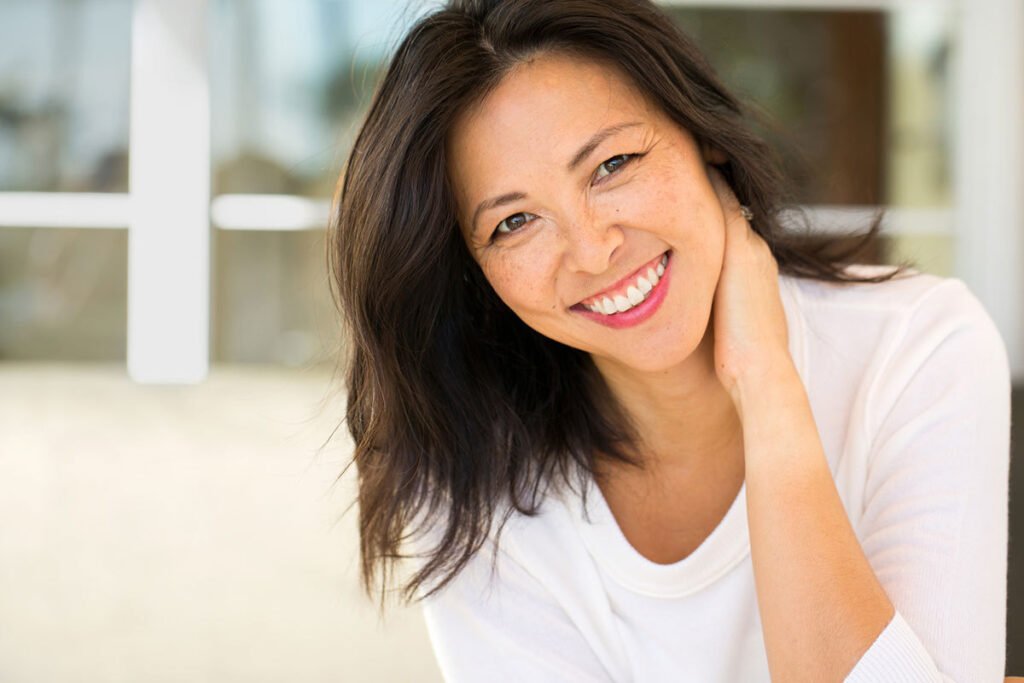 Happy Woman After Level 2 Facelift from Dr. Movassaghi's Leveled Facelift System