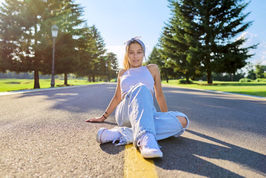 Younhg woman posing for Instagram photo in Eugene, Oregon