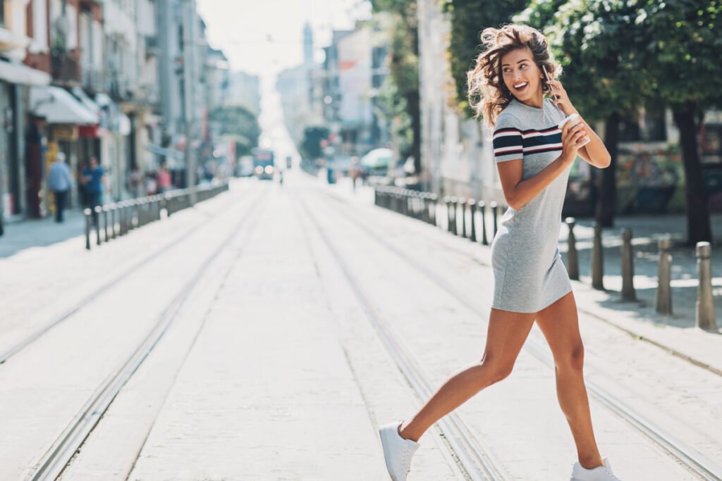 Fit & toned woman crossing the street