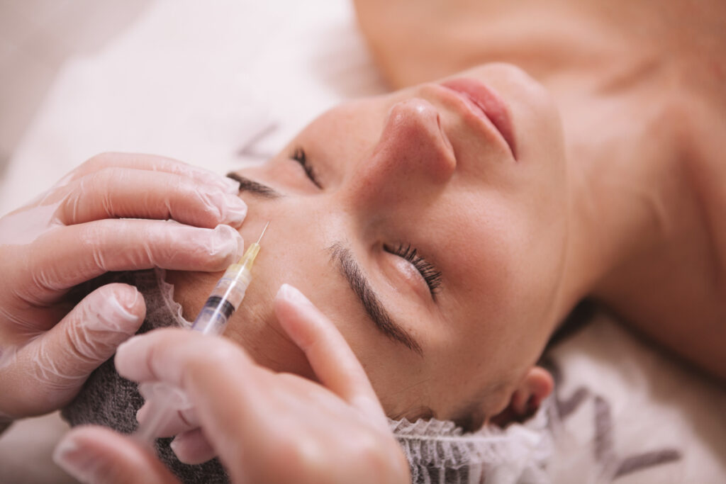 Woman receiving botox wrinkle treatment at Eugene medical spa