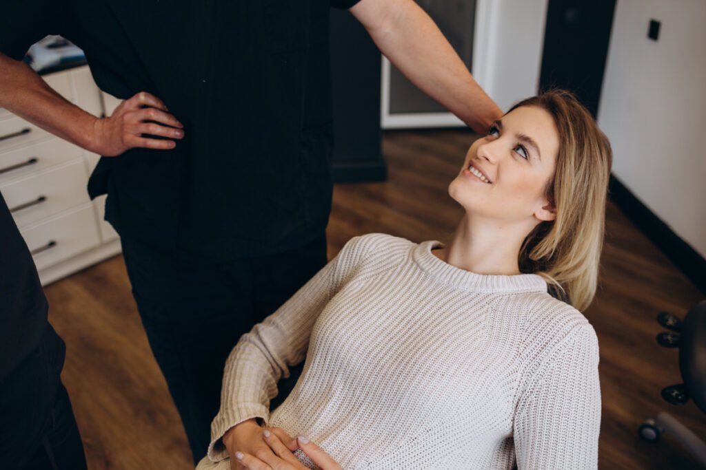 Woman at a medical spa overseen by a plastic surgeon