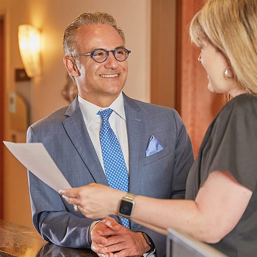 Dr. Movassaghi at the front desk